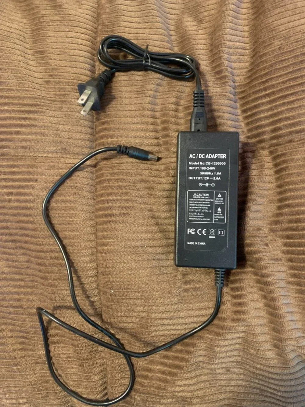 AC/DC Adapter Output: 12V 5.0A Input: 100-240V 50/60Hz 1.6A